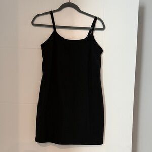 Beyond Yoga charcoal grey athletic dress with built in shorts.
